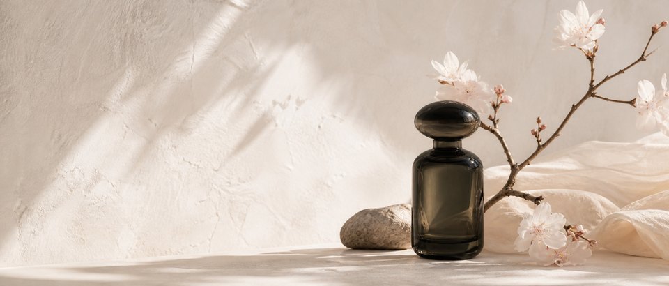 Perfume and blossom still life